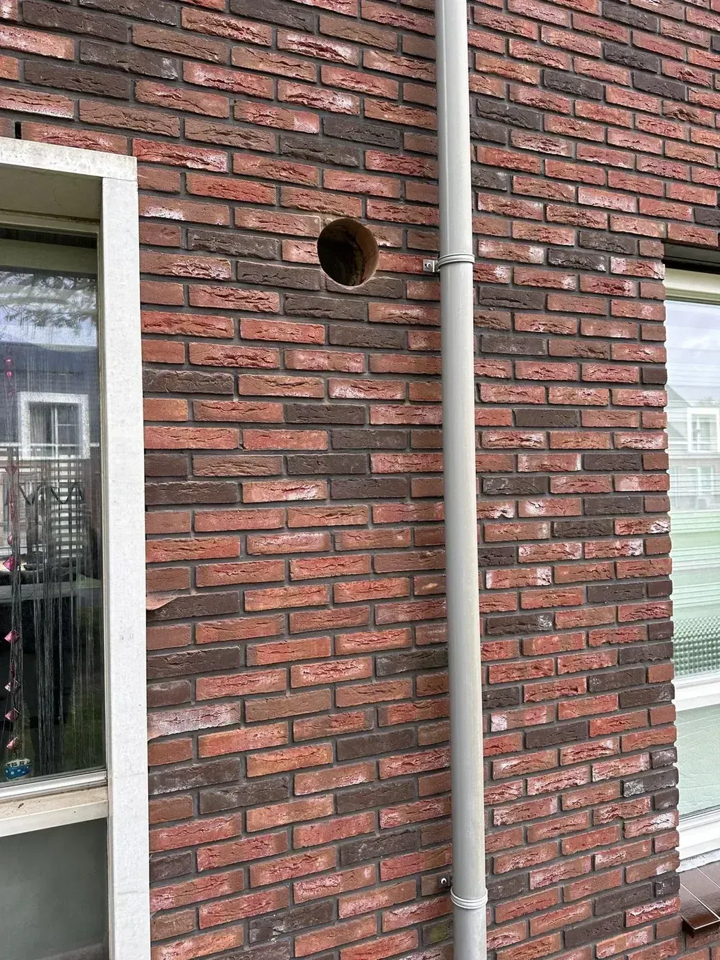 Gat boren afzuigkap buitenmuur — stofarm kernboring klaar voor dampkap doorvoer Nederland