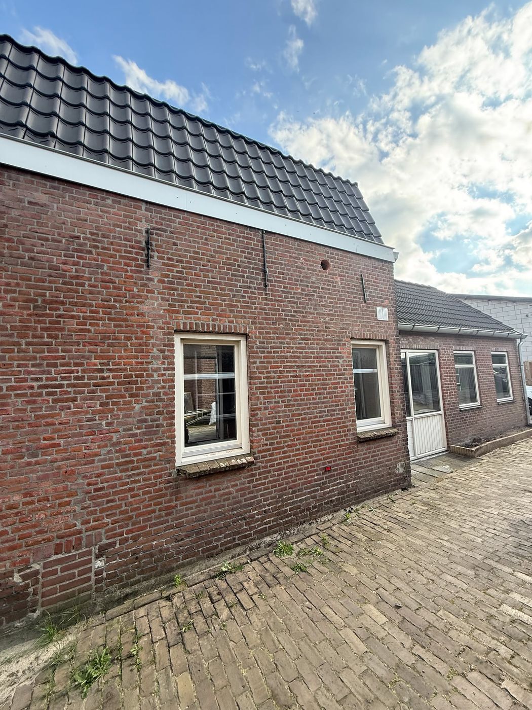 Betonboringen Weert &mdash; twee boringen in de gevel van een pand uit 1922